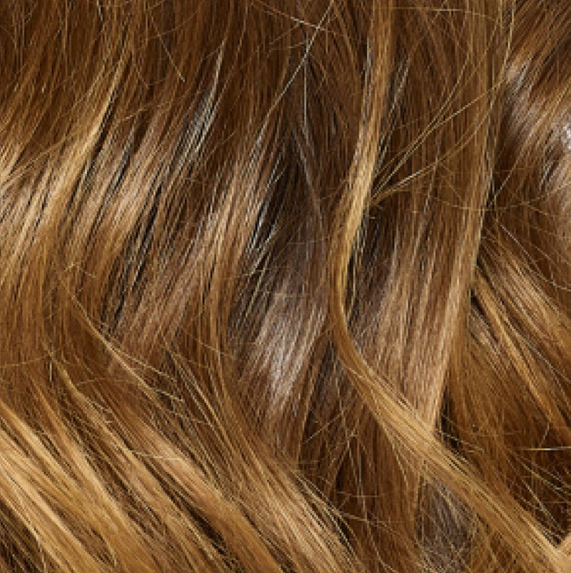 Close-up of wavy brown hair with highlights